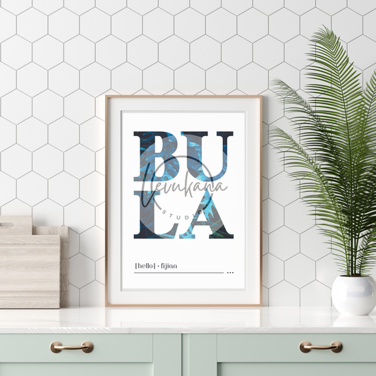 Image of Bula in Deep Blue Sea, featured in an A4 neutral wooden frame on a tallboy. Add a touch of Fiji to your home decor.