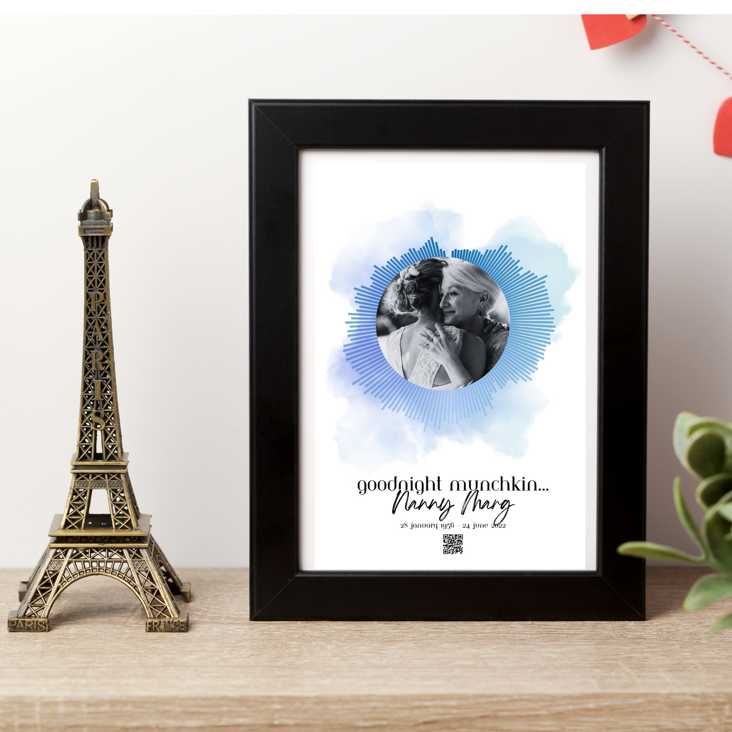 Our Portrait Soundwave Poster features a stunning gradient soundwave design in vibrant ocean blue, with a watermark of a similar colour creatively surrounding it  Add a photo to create a unique and creative image, and scan the QR code to hear their voice. Perfect for adding a special touch to any room. Available in 9 colour options.